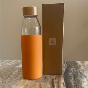 Nespresso Glass Bottle with Orange Sleeve and Bamboo Lid